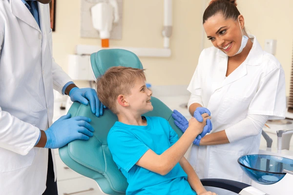 happy family dentist with patients for Preventative and Routine Dentistry care