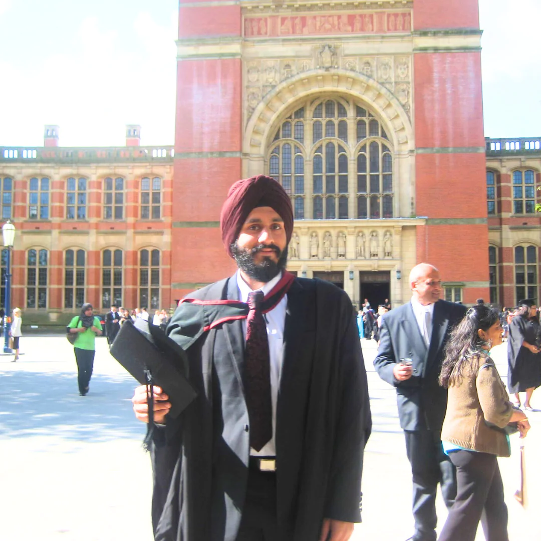 Dr Rikki Dhody graduating from the University of Birmingham
