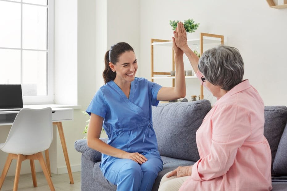 Home visit dentist greeting a senior patient in Newcastle